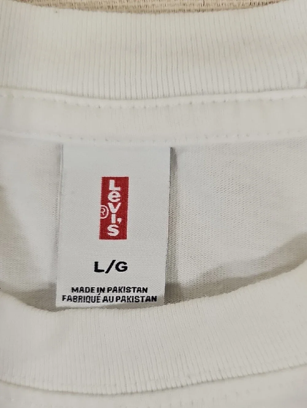 Levi's White Sonic Youth Graphic Tee with Yellow and Purple Characters